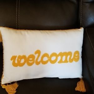 Yellow welcome pillow